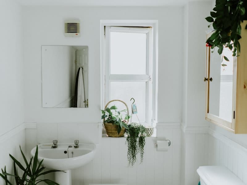 Modern Green and Gold Bathroom Renovation with Dark Green Cabinets and Modern Tile in Washington, DC